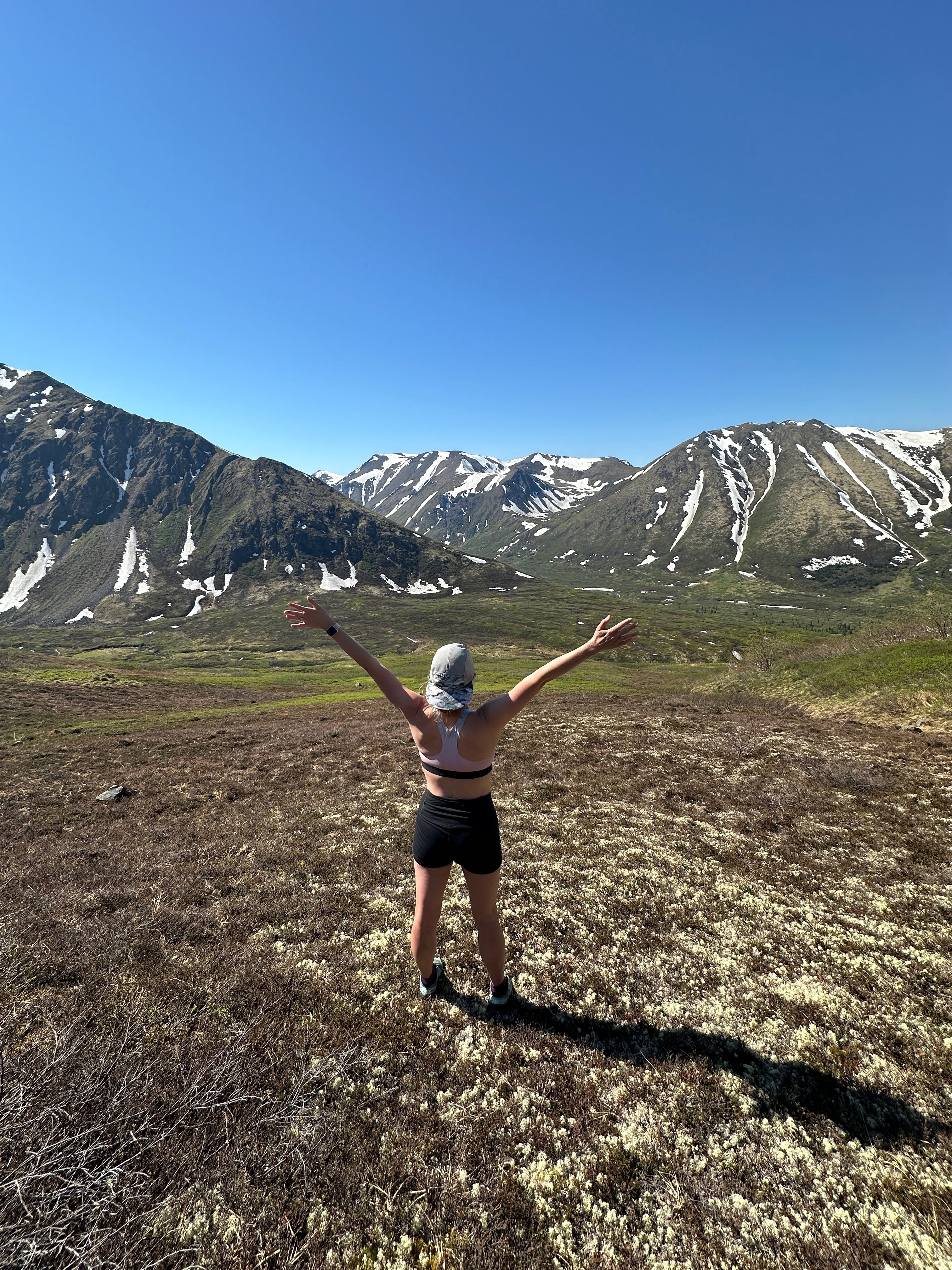 jen alpine fit hiking wearing solstice hat and other women-led brand gear
