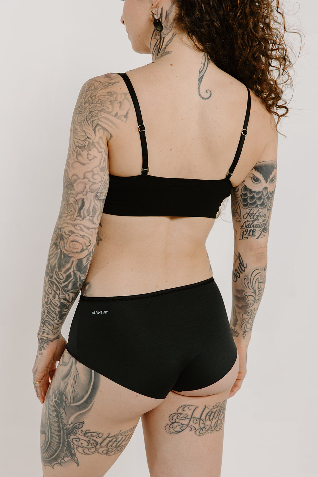 Alpine Fit Athletic Hipster Black, Full back view on off white background
