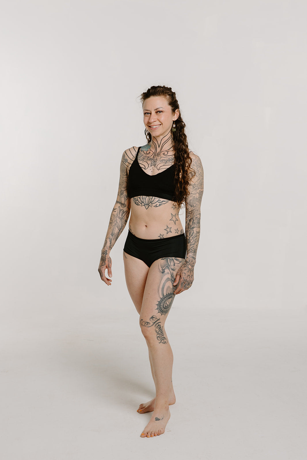 Alpine Fit Athletic Hipster Black, Woman wearing hipster full front view on off white background