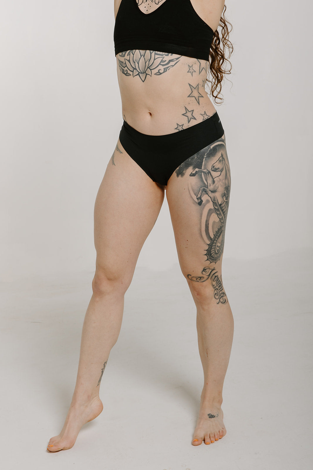 Alpine Fit Athletic Thong Obsidian Cove Black, Woman wearing athletic thong full view