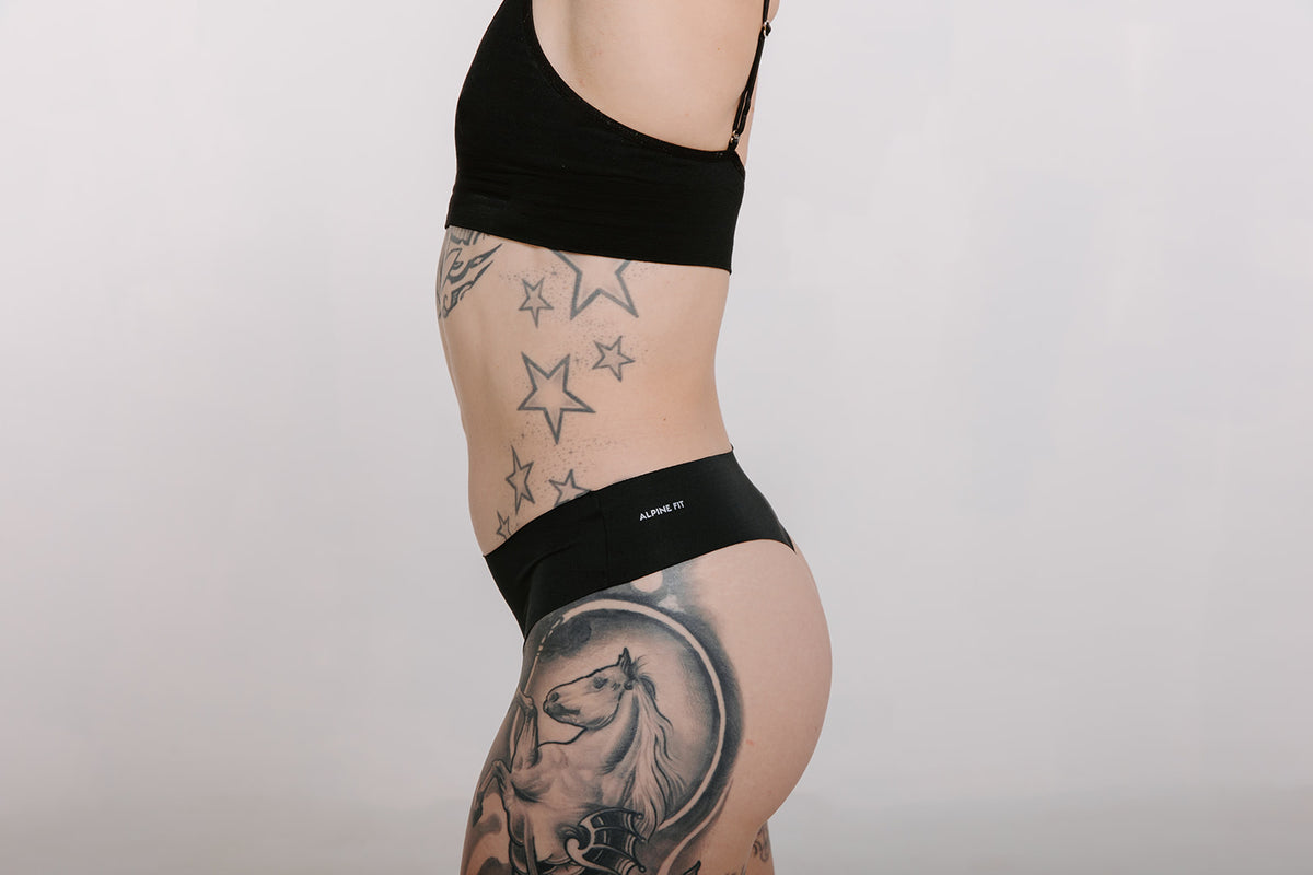 Alpine Fit Athletic Thong Obsidian Cove Black, Woman wearing athletic thong, Close up left side view