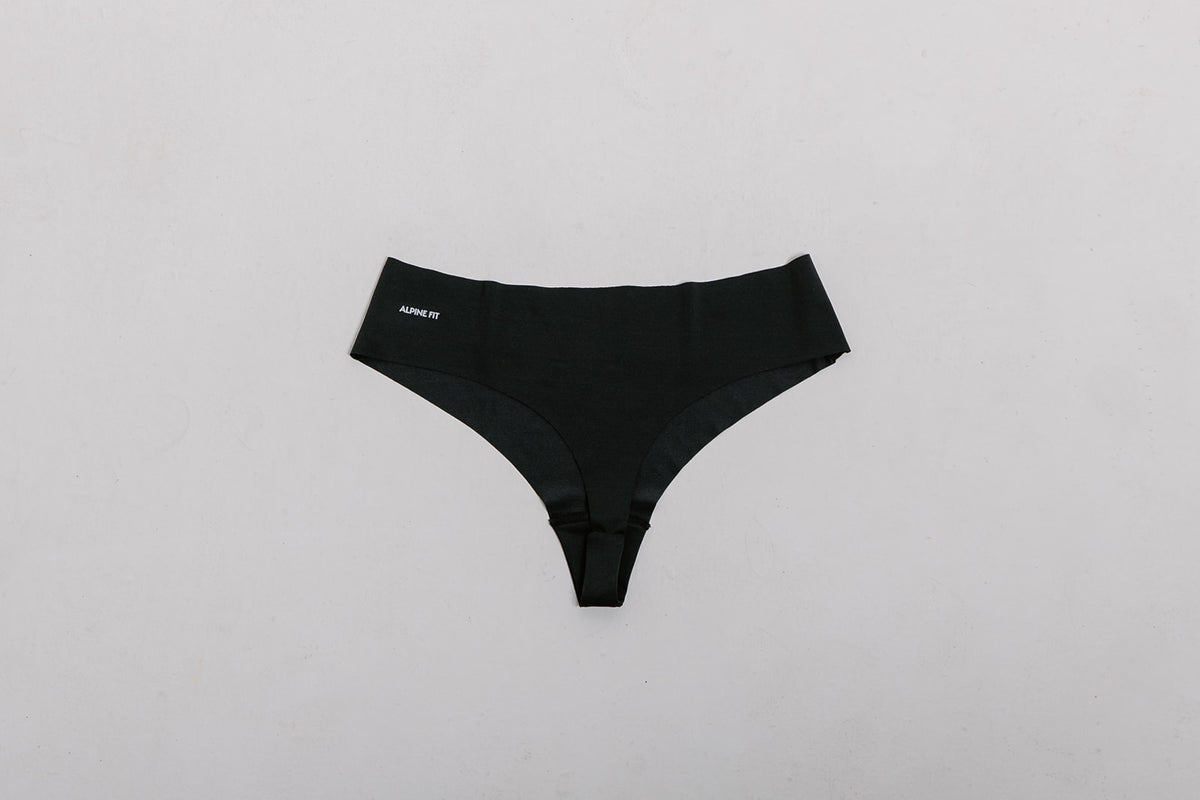 Alpine Fit Athletic Thong Obsidian Cove Black, Flat lay with off white background