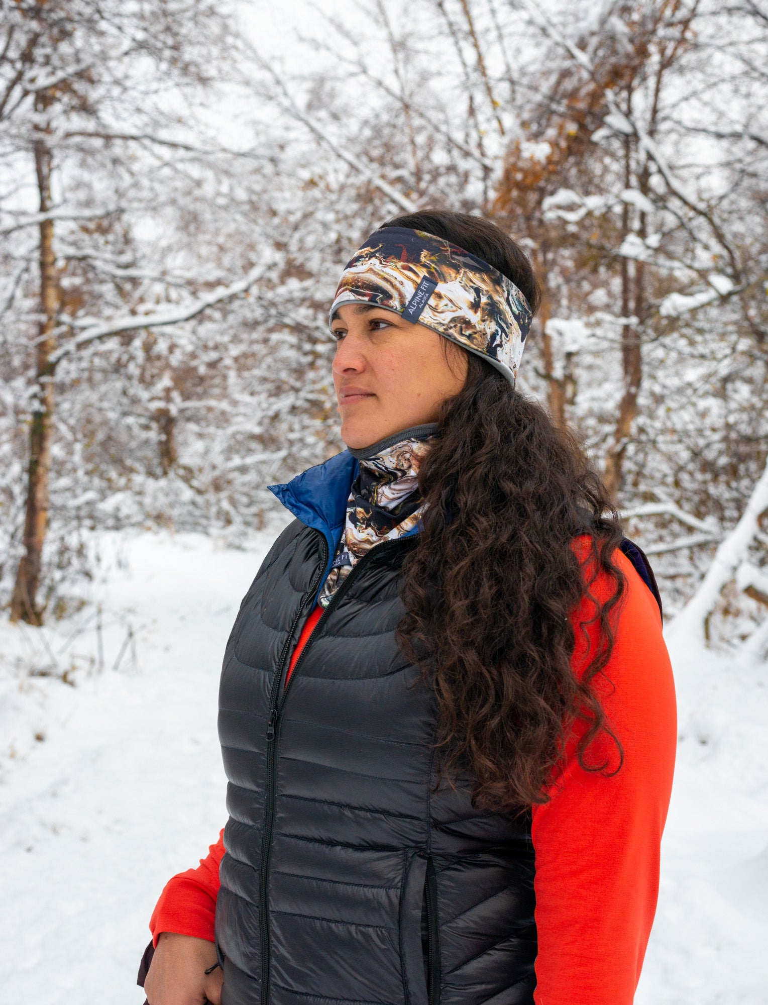 alpine fit fleece lined headband on model outside with neck gaiter and base layer top