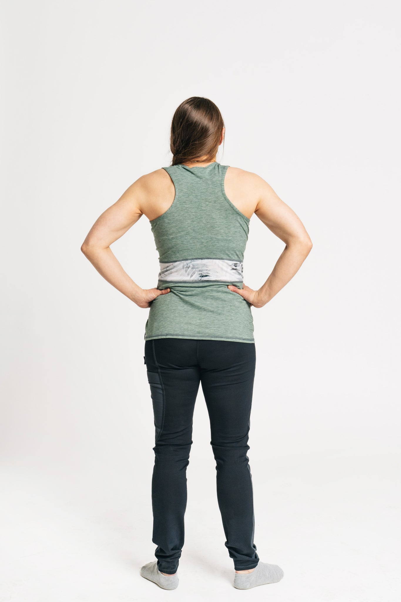 alpine fit tank top green on model back view