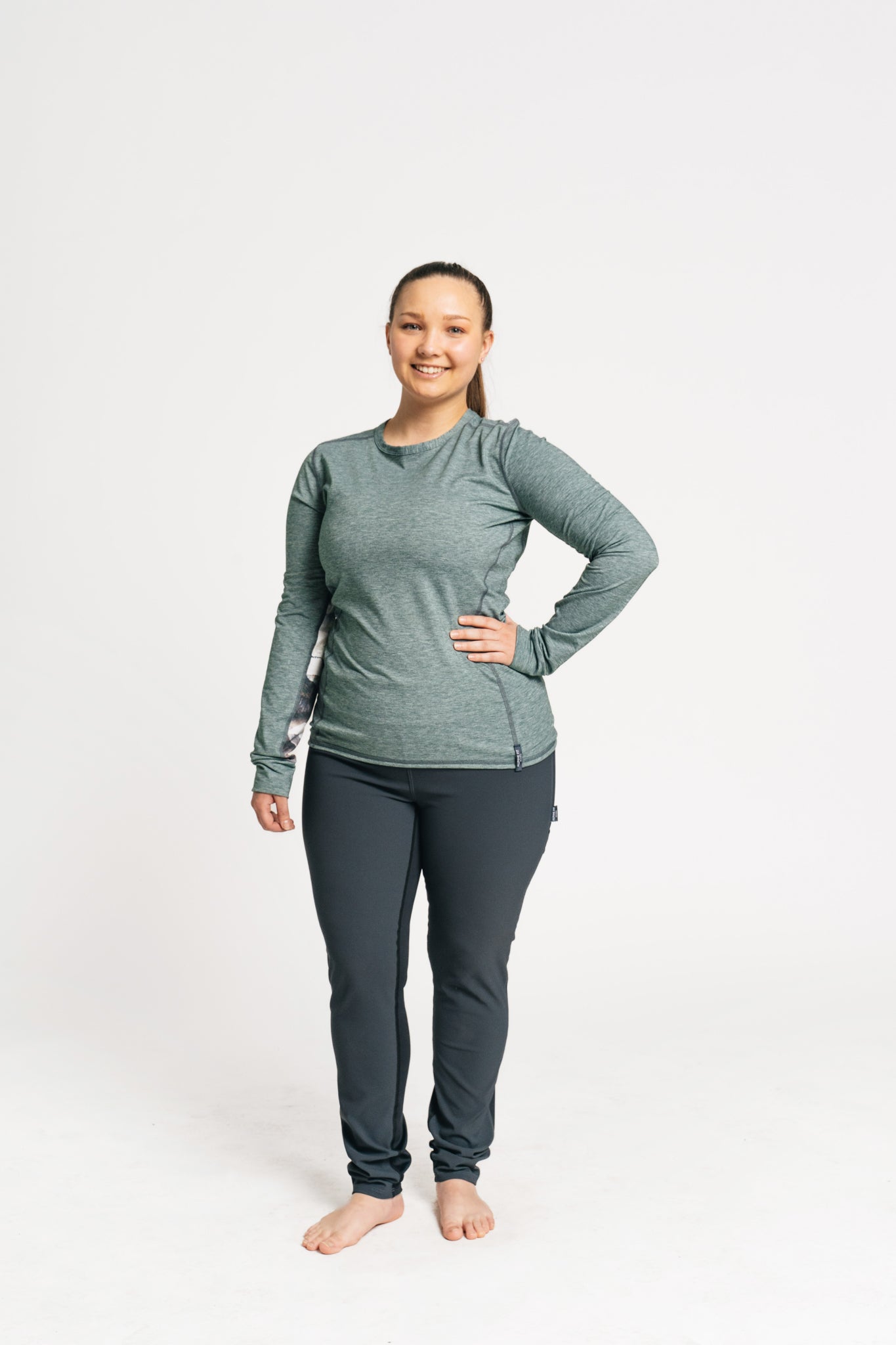 alpine fit long sleeve base layer green on model front view