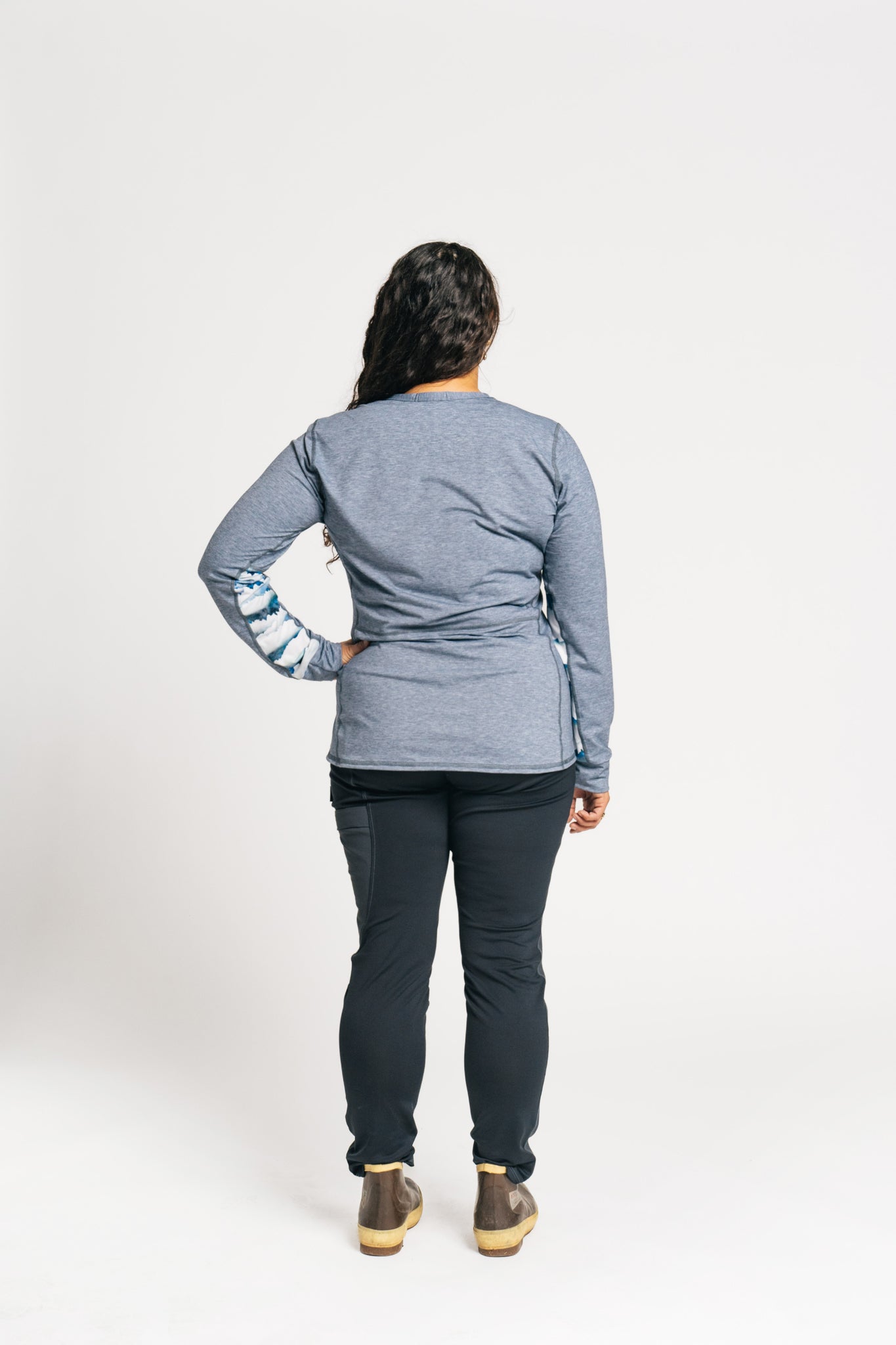 alpine fit long sleeve base layer on model viewed from behind