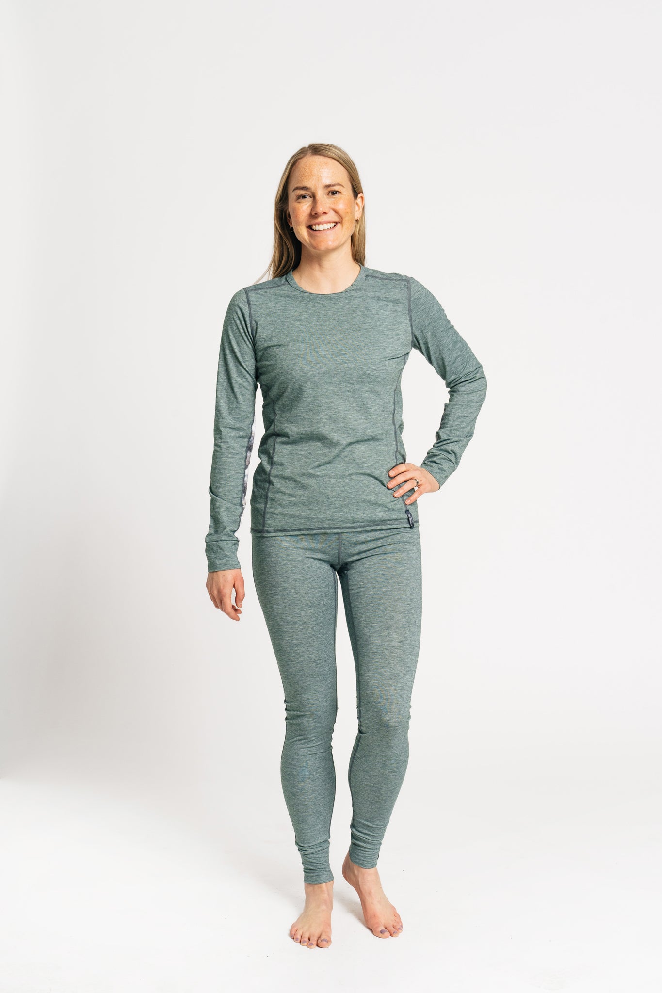 alpine fit long sleeve base layer green on model front view