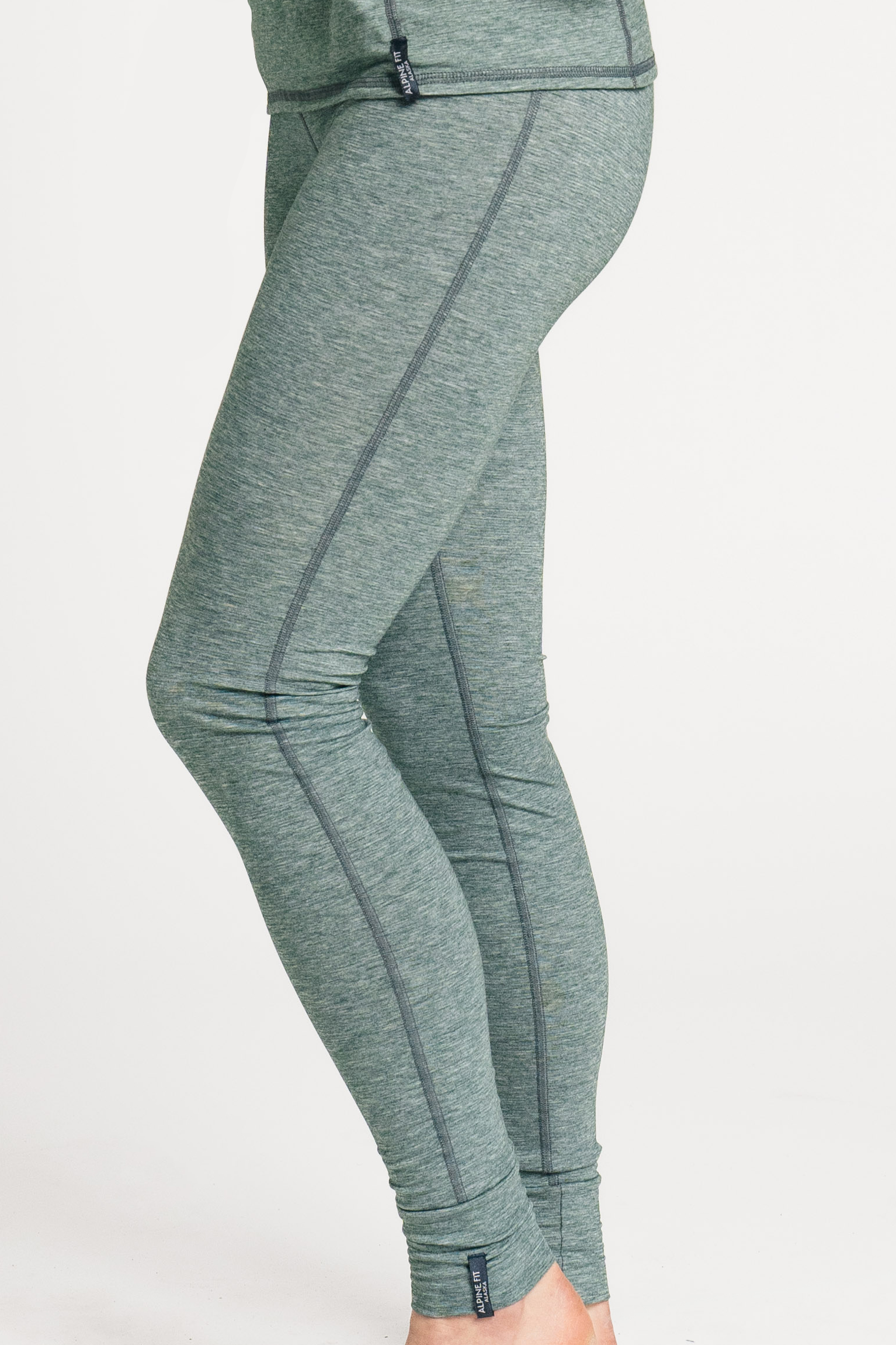 - Alpine fit backcountry base layer bottoms winter moss green main close up image