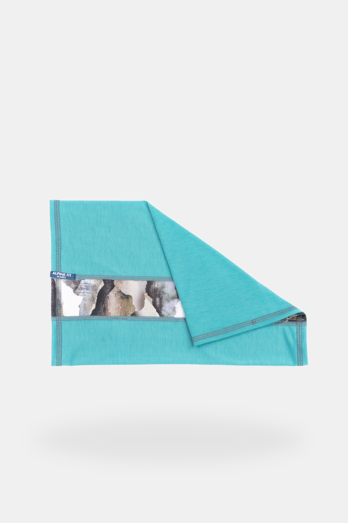 Alpine fit geo neck gaiter glacial teal folded image