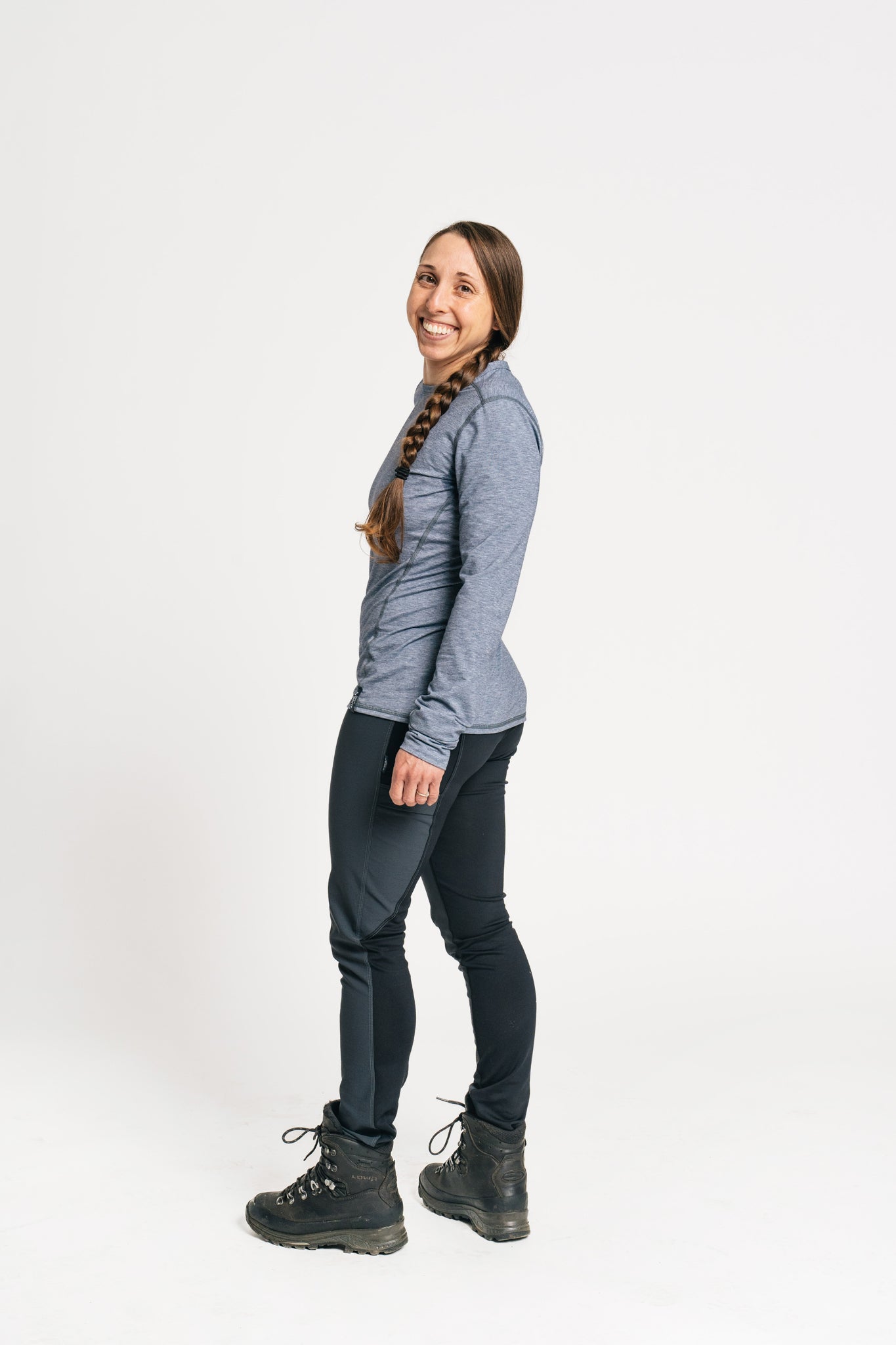 alpine fit hiking leggings on model side view in hiking boots