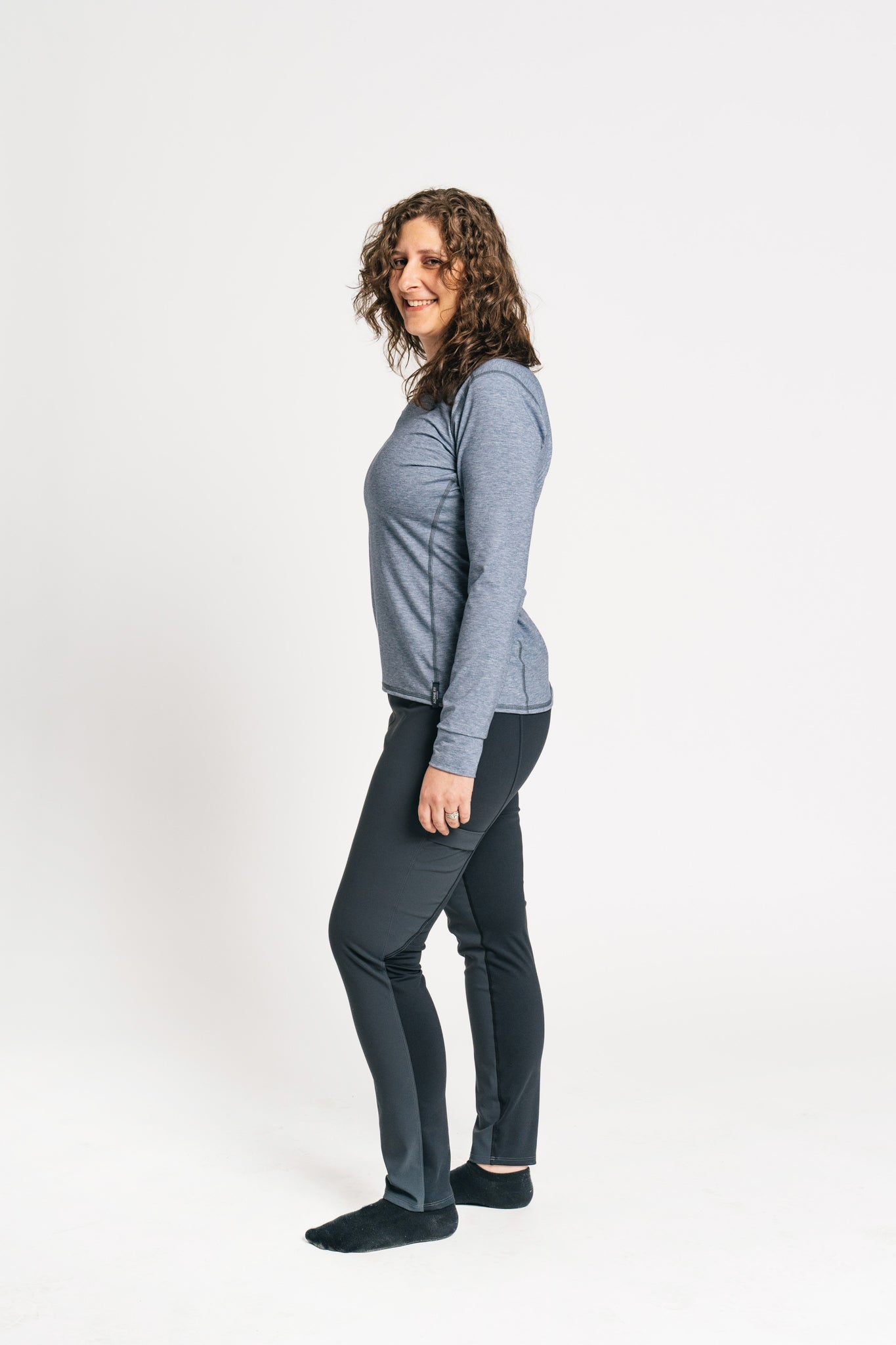 alpine fit long sleeve base layer blue on model side view