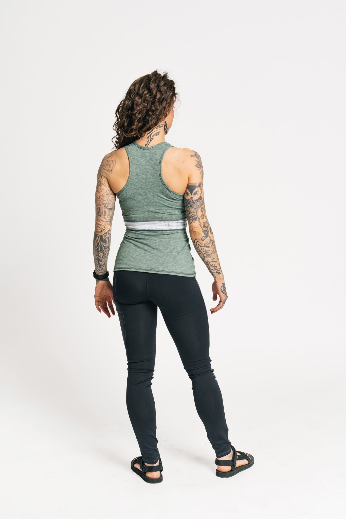 alpine fit hiking leggings on model with tattoo from behind