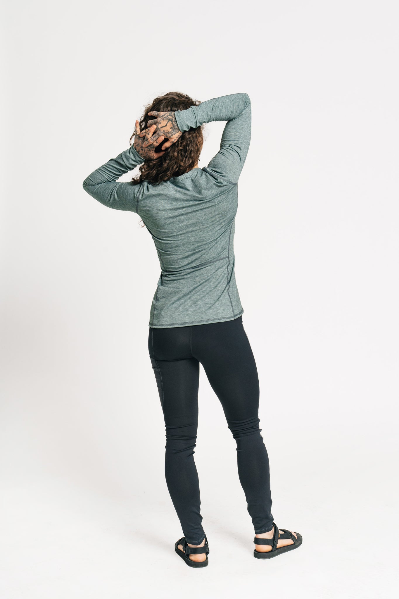 alpine fit long sleeve base layer green on model back view petite