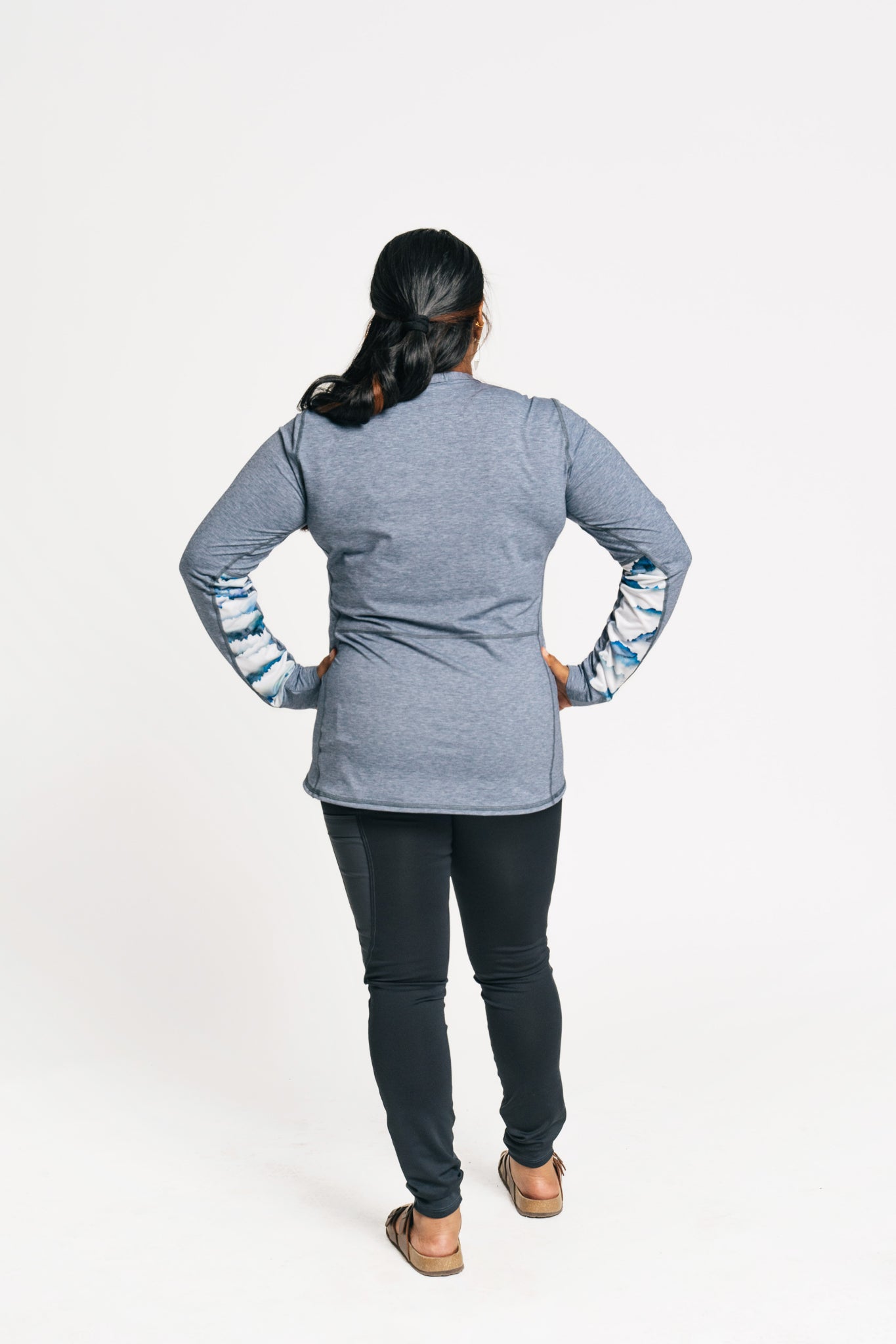 alpine fit long sleeve base layer blue on model from behind