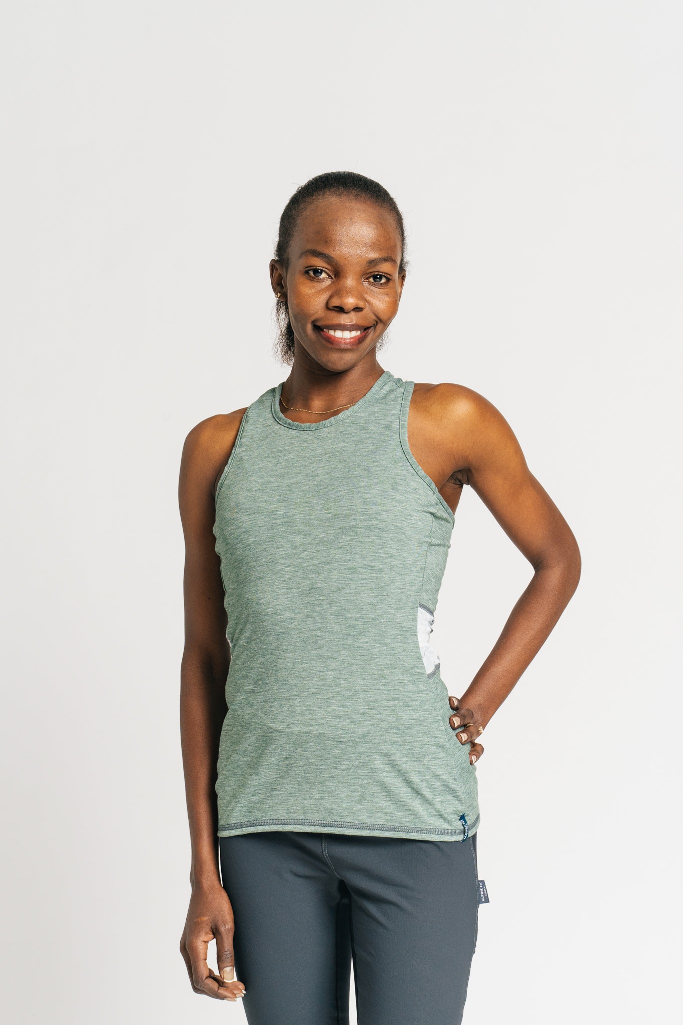 alpine fit tank top green on model front