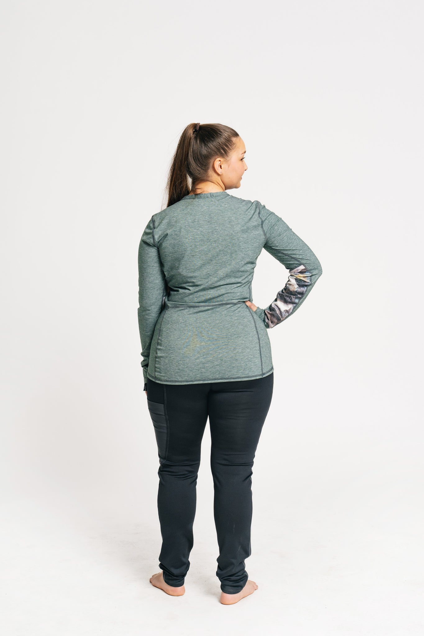 alpine fit hiking leggings on model from behind