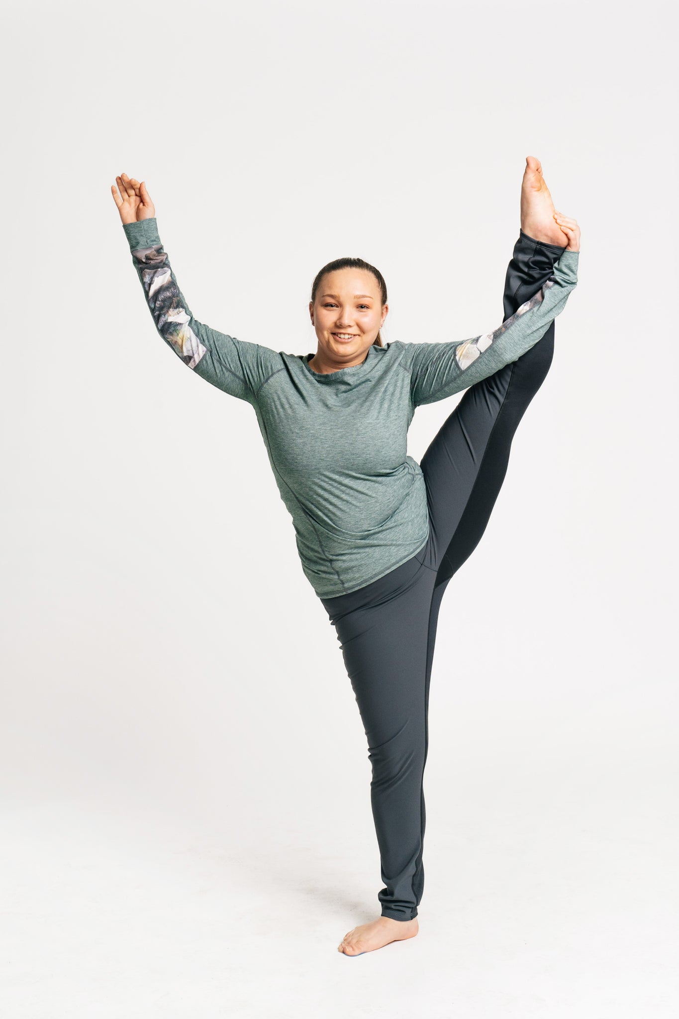 alpine fit hiking leggings showing stretch on model